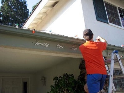 christmas lights being hung